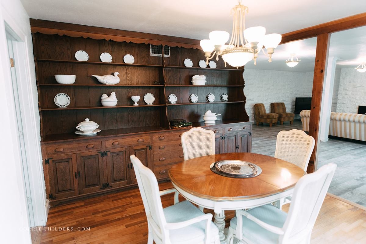 Living room with original hardwood floors and period sofa