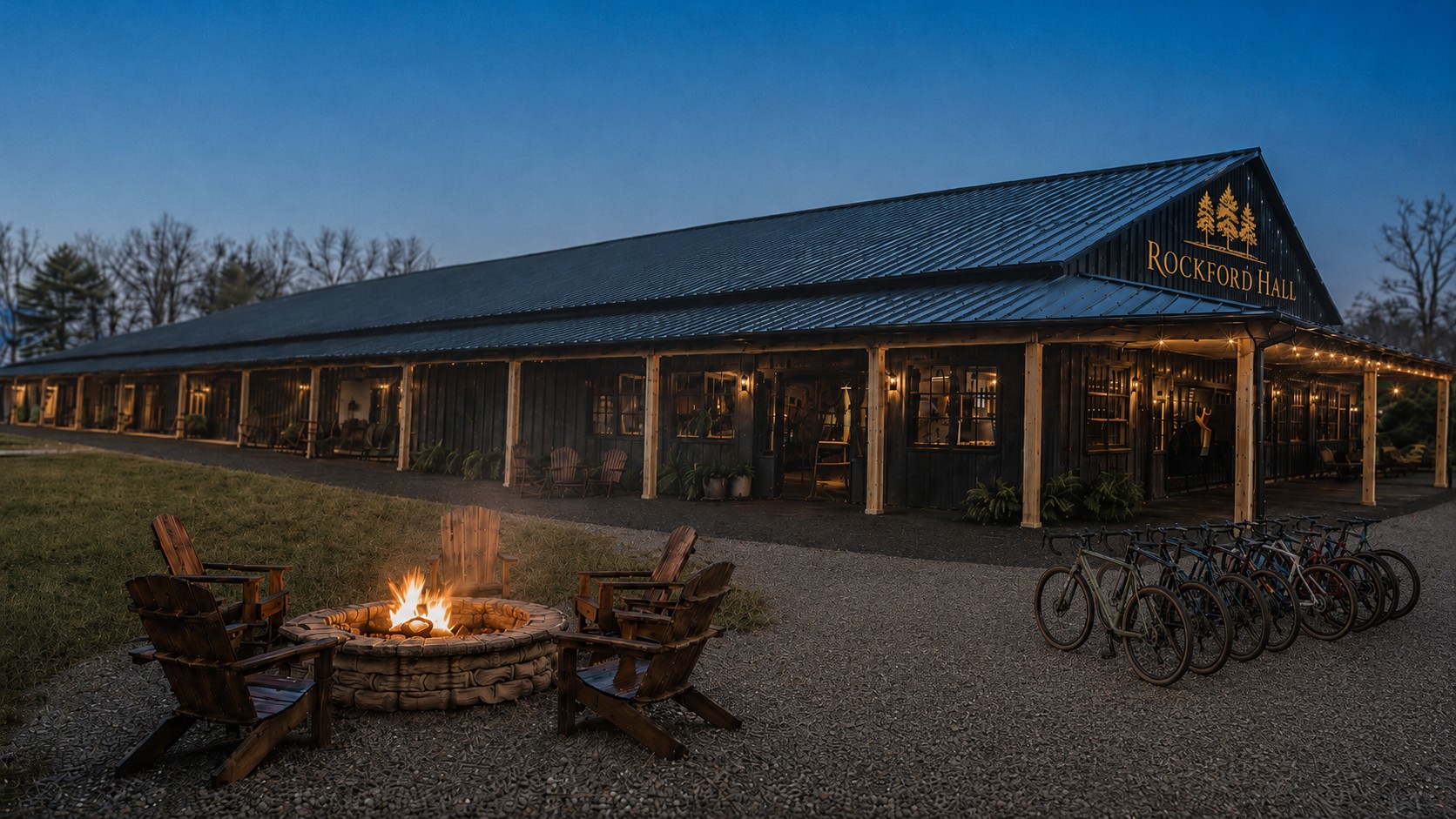 Rockford Hall exterior at blue hour with fire pit and bikes